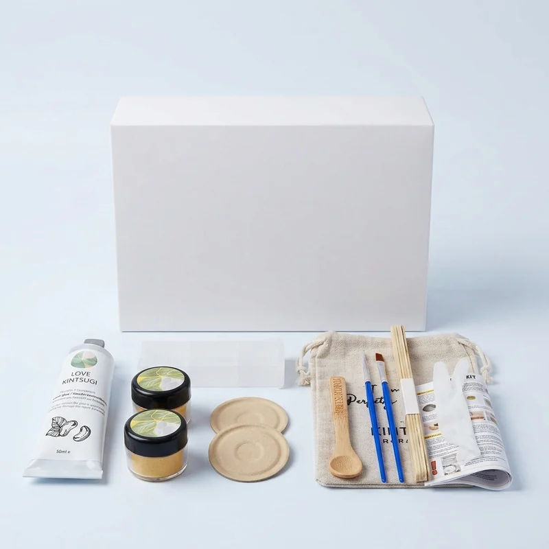 EIGTWEN kintsugi kit with ceramic bowl repaired with golden seams